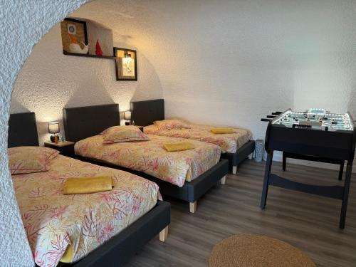 En eller flere senge i et værelse på Nancy, Fun et Atypique !