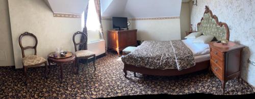 Letto o letti in una camera di Hotel Boutique ANEMONA
