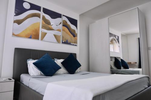 Postel nebo postele na pokoji v ubytování Spinola Apartment