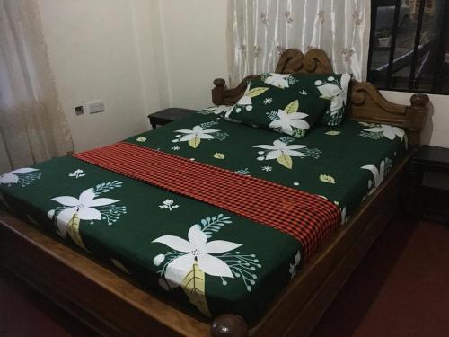 En eller flere senge i et værelse på Humphrey home stay