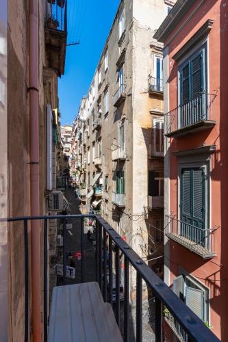 a view of an alley from a balcony at Napoli Visit Home in Naples