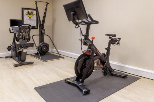 a room with a gym with an exercise bike at Hilton York in York