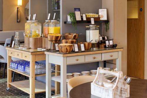 a counter with bowls on top of a table at Hilton York in York