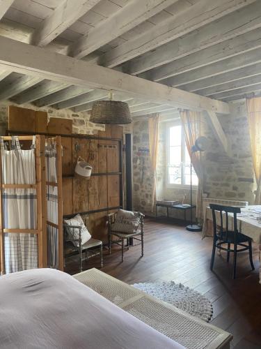 Postel nebo postele na pokoji v ubytování Chambre d’hôtes La Ferté