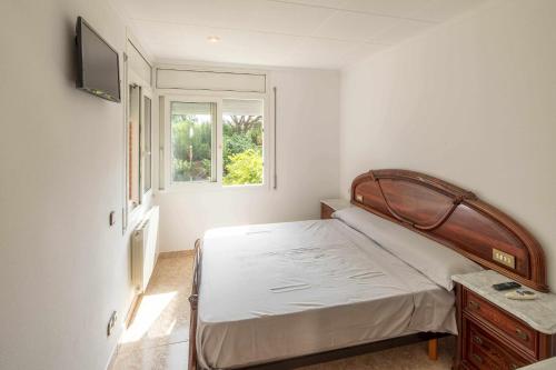 Кровать или кровати в номере Casa con piscina en Vilobí dOnyar