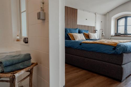 Ένα ή περισσότερα κρεβάτια σε δωμάτιο στο Bed & Breakfast Fort Bakkerskil