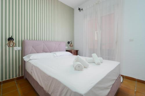 Postel nebo postele na pokoji v ubytování Panther Home Islantilla Club