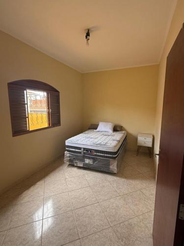 En eller flere senge i et værelse på Refúgio do Peregrino do Lado da Igreja Matriz