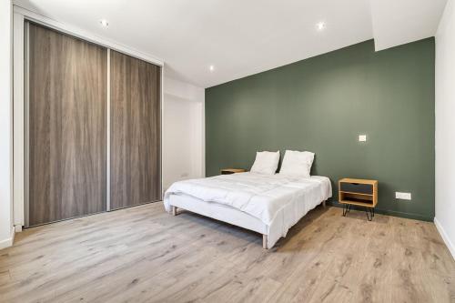 En eller flere senge i et værelse på Hypercentre, à deux pas du Lac