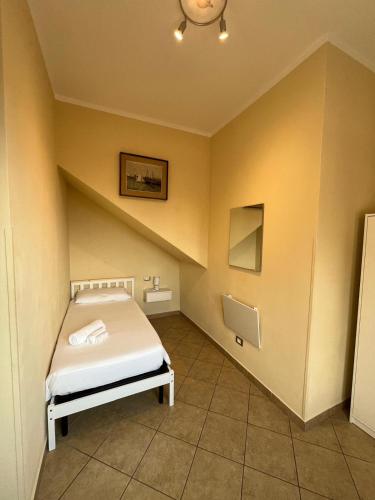 a bedroom with a bed in a room at B&B Garzola in Ossuccio