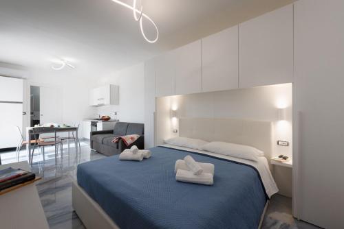 Postel nebo postele na pokoji v ubytování Infinity Residence con Parcheggio