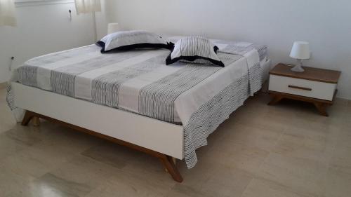 Postel nebo postele na pokoji v ubytování Villa Nissma