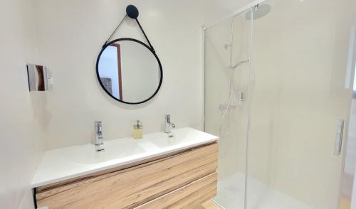 a bathroom with a sink and a mirror at DOMAINE CARDU in Cardo-Torgia