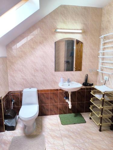 Koupelna v ubytování Hotel Delfin