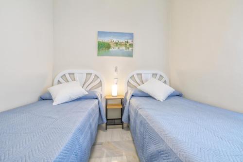 Ένα ή περισσότερα κρεβάτια σε δωμάτιο στο La Casita de Marcelo