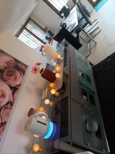 an overhead view of a living room with a glass table at Devils Peak Prague in Prague