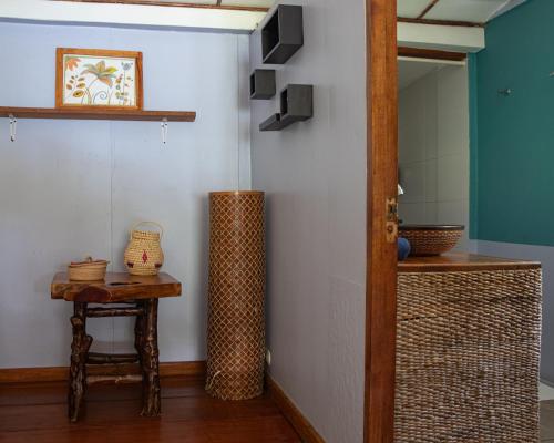 a room with a table and a clock on the wall at Casa Marimba in La Laguna