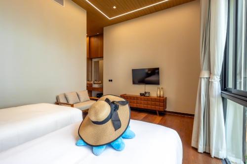 Ένα ή περισσότερα κρεβάτια σε δωμάτιο στο Sinae Residence