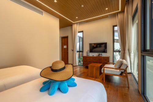 Ένα ή περισσότερα κρεβάτια σε δωμάτιο στο Sinae Residence
