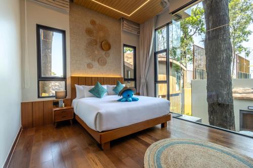 Ένα ή περισσότερα κρεβάτια σε δωμάτιο στο Sinae Residence