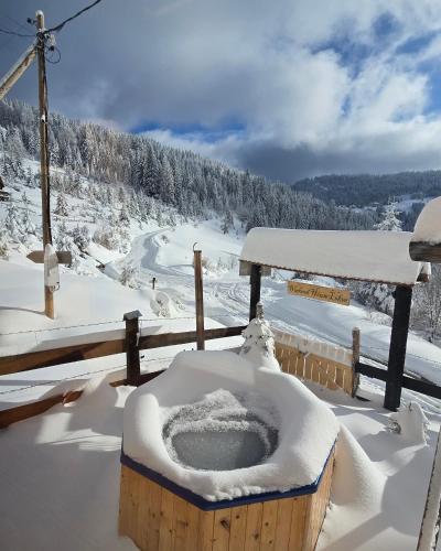 a hot tub covered in snow on top of a mountain at Weekend house Lokve - Modern in Berane