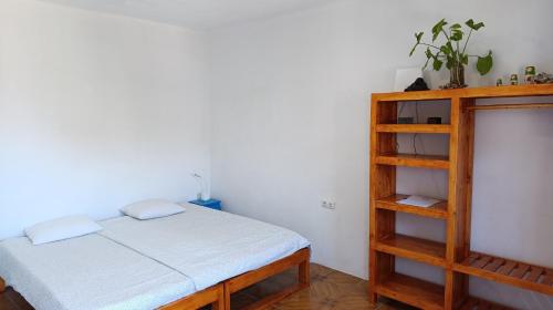 Postel nebo postele na pokoji v ubytování Oiá Paúl