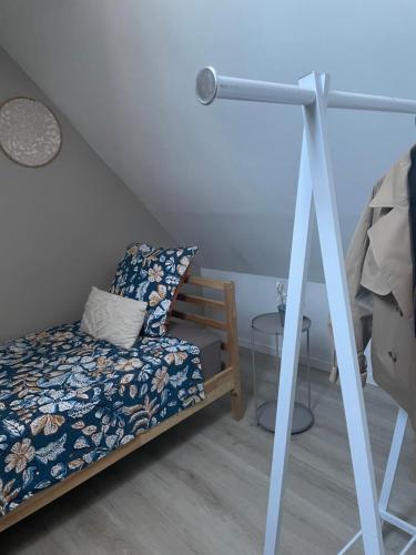 Postel nebo postele na pokoji v ubytování Escale à Beauvais
