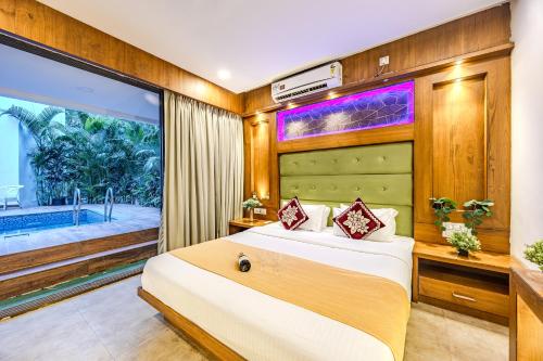 Katil atau katil-katil dalam bilik di 3bhk Luxurious Villa with Private Pool