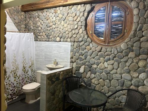 Ένα μπάνιο στο Hostal Corazón de Tagua