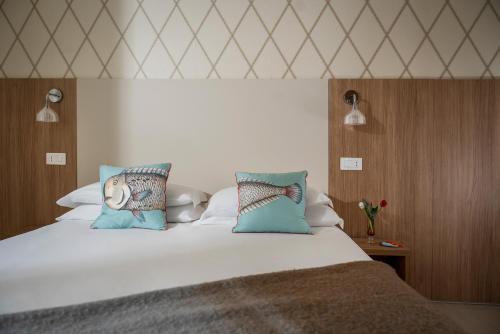 Cama o camas de una habitación en Hotel Calypso- Rimini Marina Centro