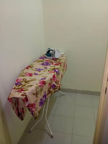 a table with a phone sitting on top of it at Villa Z in Ouagadougou