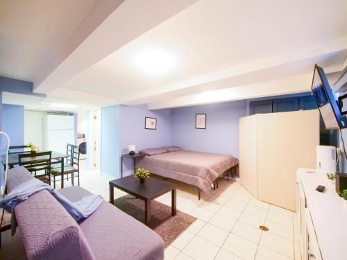 Katil atau katil-katil dalam bilik di Cozy Studio Unit Close to New York City