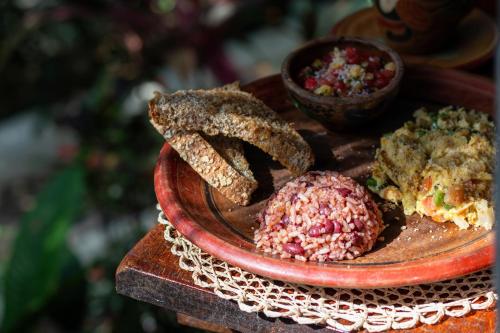 a plate of food with bread and meatballs on it at Casa Marimba in La Laguna