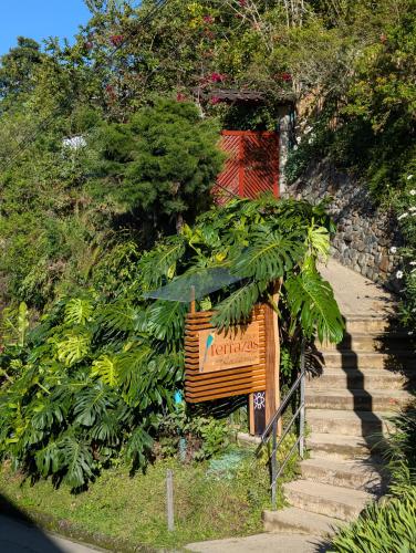 a sign on the side of a hill with plants at Terrazas de Salento in Salento
