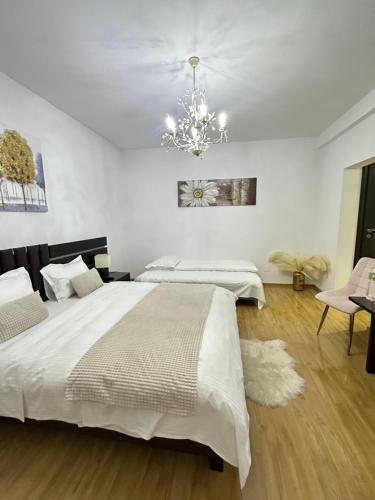 Voodi või voodid majutusasutuse Vila Zoe BucharestAirport&Therme&Parking Otopeni toas