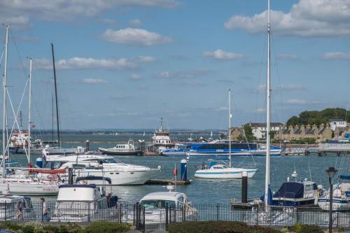 a bunch of boats docked in a harbor at Marina View in Cowes
