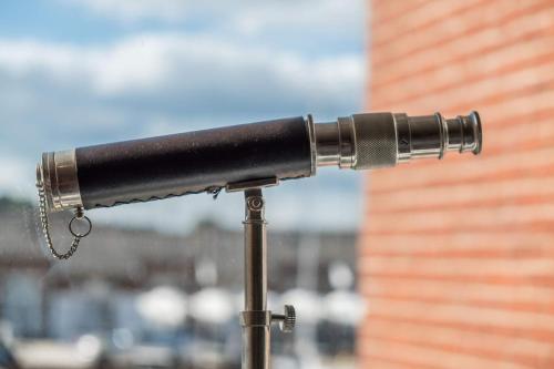 a black microphone on a pole with a chain at Marina View in Cowes