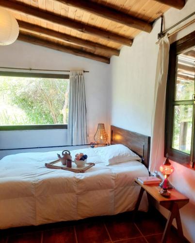 Ένα ή περισσότερα κρεβάτια σε δωμάτιο στο Casa a los pies del cerro Uritorco