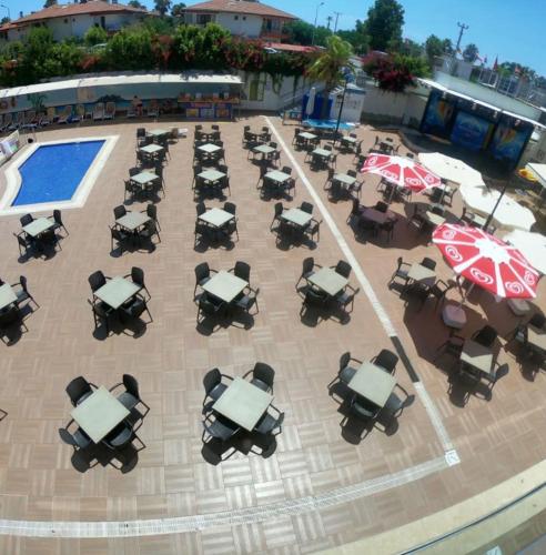 an overhead view of tables and umbrellas on a patio at Linda Sunny Beach Hotel & Spa-Ultra All Inclusive in Side