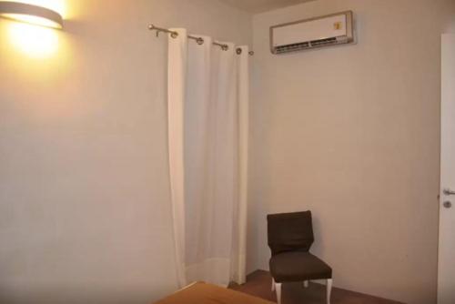 TV a/nebo společenská místnost v ubytování Infinity Pool Villa