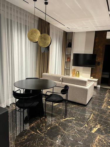 Μια τηλεόραση ή/και κέντρο ψυχαγωγίας στο AXEL Baltic Apartament DeLuxe
