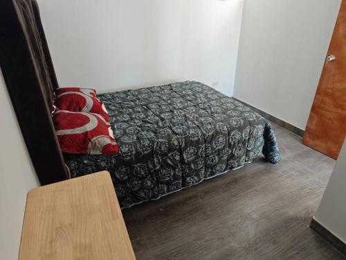 Ένα ή περισσότερα κρεβάτια σε δωμάτιο στο Habitacion con Cochera