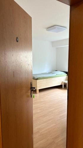Postel nebo postele na pokoji v ubytování Monteurzimmer Ringingen