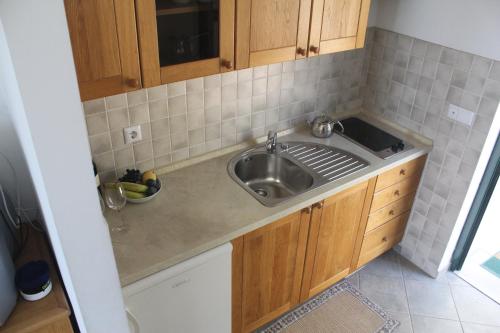 Kuchyň nebo kuchyňský kout v ubytování Villa Simpatia