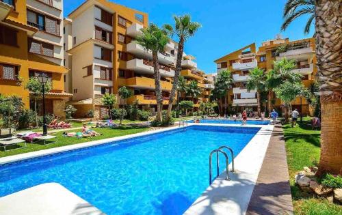 Fotografie z fotogalerie ubytování Turquesa Apartment,Punta Prima ,2 bed, 4 swimming pools and cabriolet Peugeot 307 included v destinaci Torrevieja