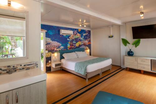 Cama ou camas em um quarto em Hotel Reina del Mar By Dorado