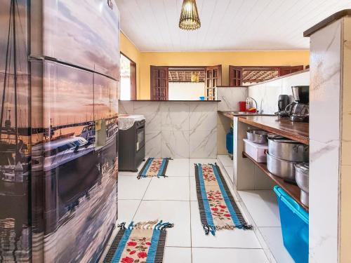Una cocina o zona de cocina en Casa com Piscina em Marechal Deodoro