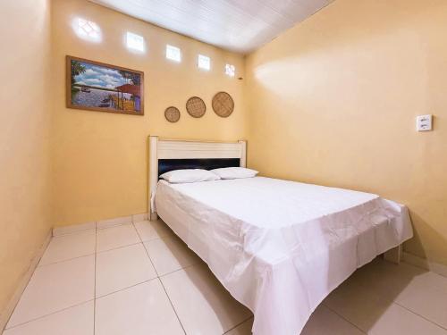 Cama o camas de una habitación en Casa com Piscina em Marechal Deodoro