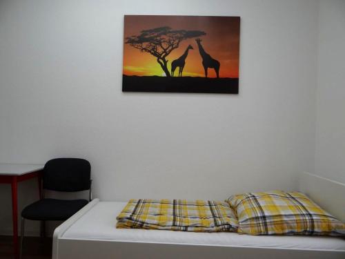 Ένα ή περισσότερα κρεβάτια σε δωμάτιο στο ApartDays Giesen