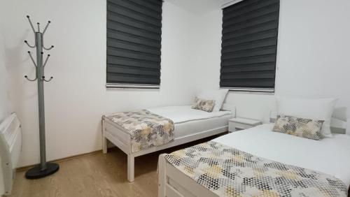 Postel nebo postele na pokoji v ubytování Guest House Green Field